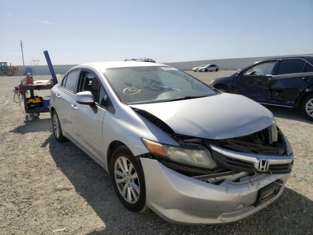 HONDA CIVIC LX 2012 with VIN 2HGFB2E54CH513712 - Photo from auction