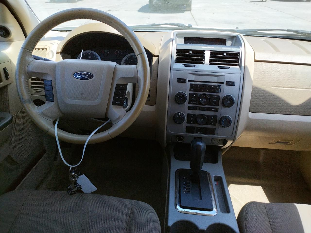 Photo 9 from auction – 2009 FORD ESCAPE XLS with VIN 1FMCU03GX9KB70132