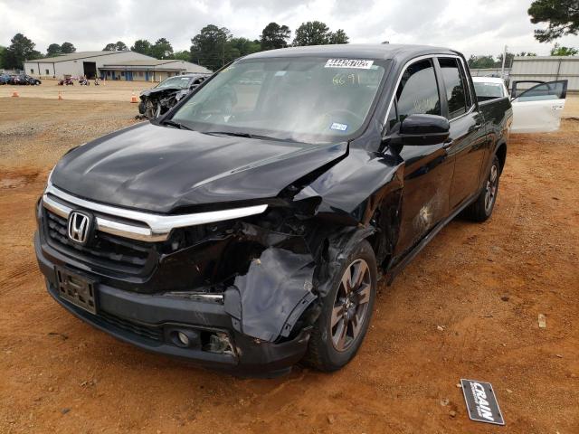 Photo 2 from auction – 2017 HONDA RIDGELINE with VIN 5FPYK2F63HB006691