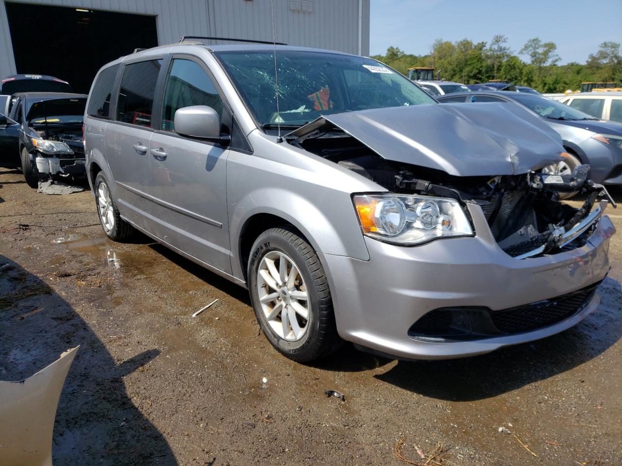 DODGE GRAND CARA 2015 with VIN 2C4RDGCG9FR548946 - Photo from auction