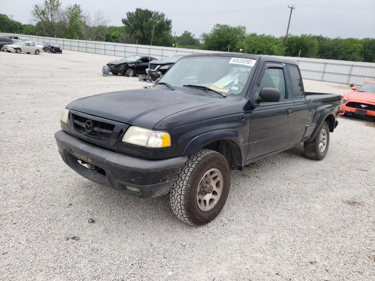 Photo 12 from auction – 2002 MAZDA B3000 CAB with VIN 4F4YR16V82TM23869
