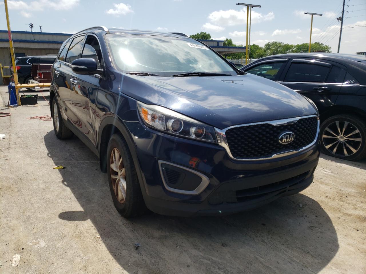 KIA SORENTO LX 2016 with VIN 5XYPG4A32GG118484 - Photo from auction