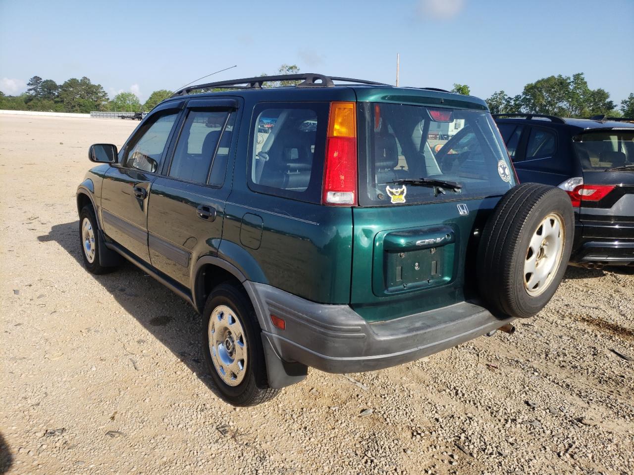 Photo 3 from auction – 1999 HONDA CRV with VIN JHLRD2840XC001451