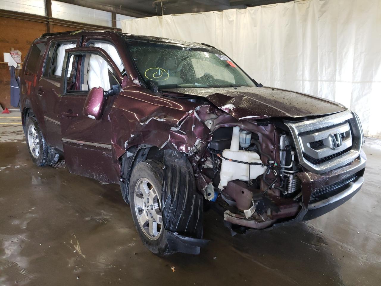 HONDA PILOT TOUR 2010 with VIN 5FNYF4H88AB008806 - Photo from auction
