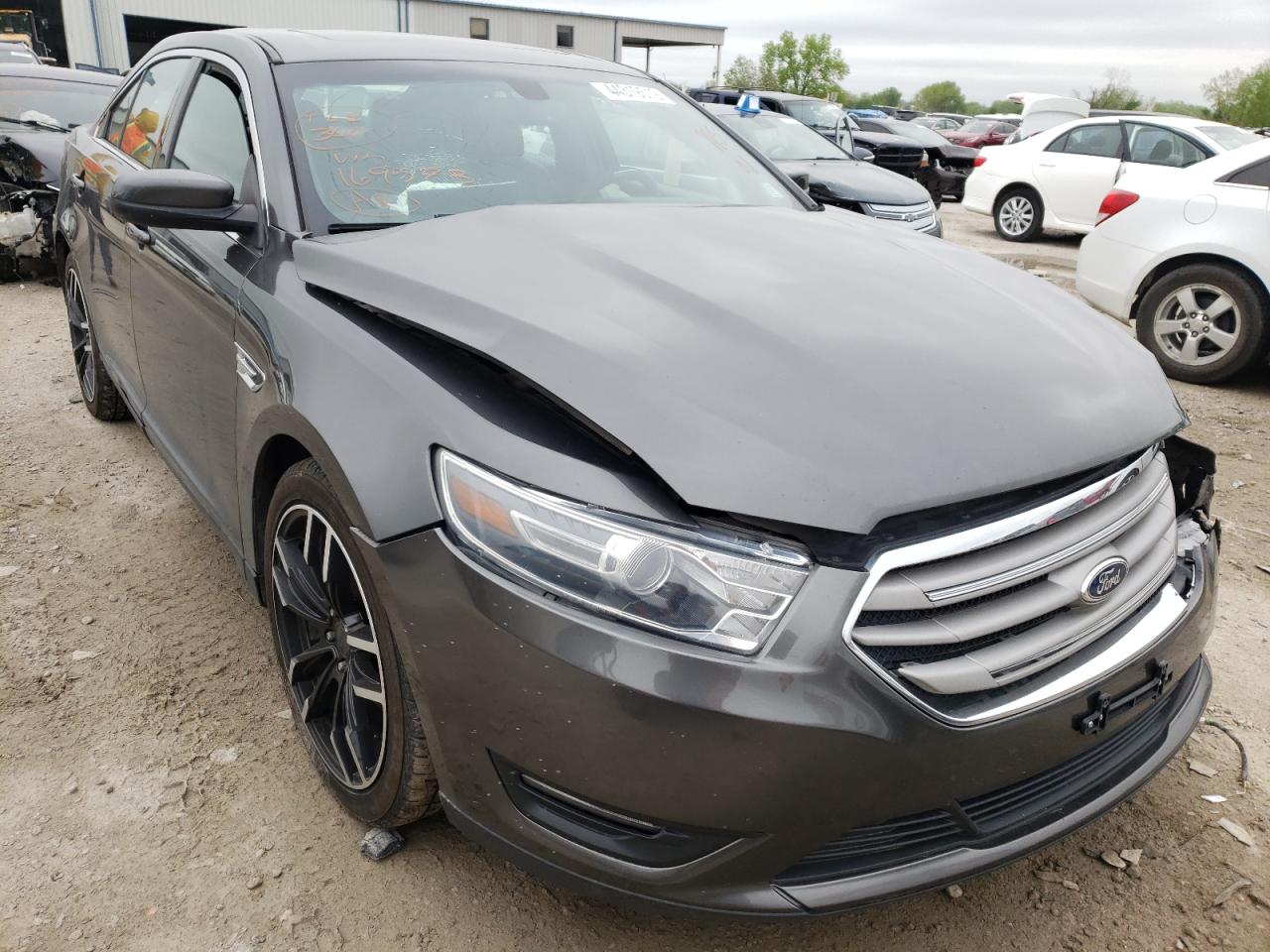 FORD TAURUS SEL 2015 with VIN 1FAHP2E83FG169573 - Photo from auction