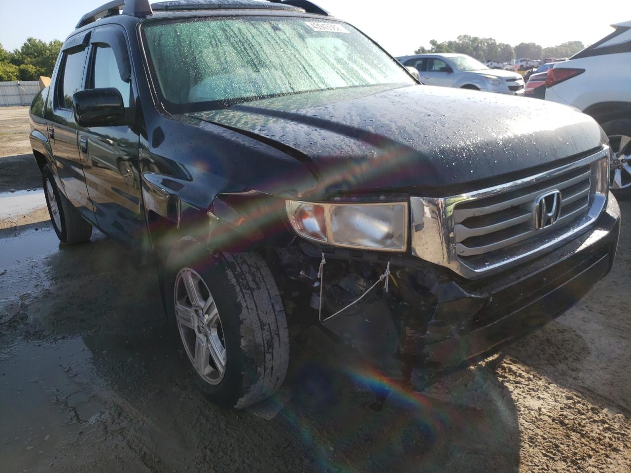 Photo 9 from auction – 2014 HONDA RIDGELINE with VIN 5FPYK1F53EB006509