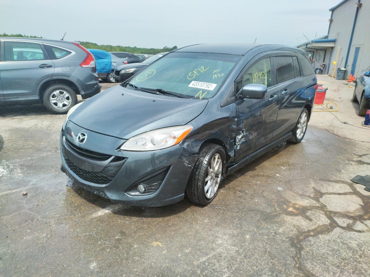 Photo 2 from auction – 2012 MAZDA 5 with VIN JM1CW2CLXC0141952