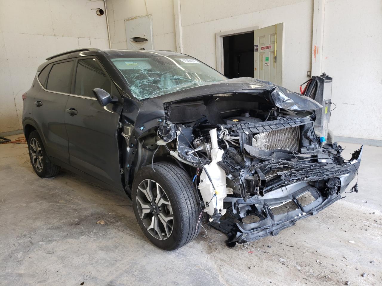 KIA SELTOS EX 2021 with VIN KNDERCAA8M7104754 - Photo from auction