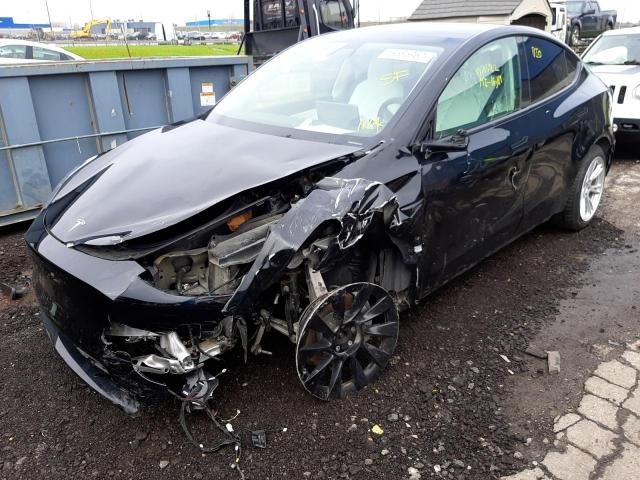 Photo 2 from auction – 2021 TESLA MODEL Y with VIN 5YJYGDEE8MF141576