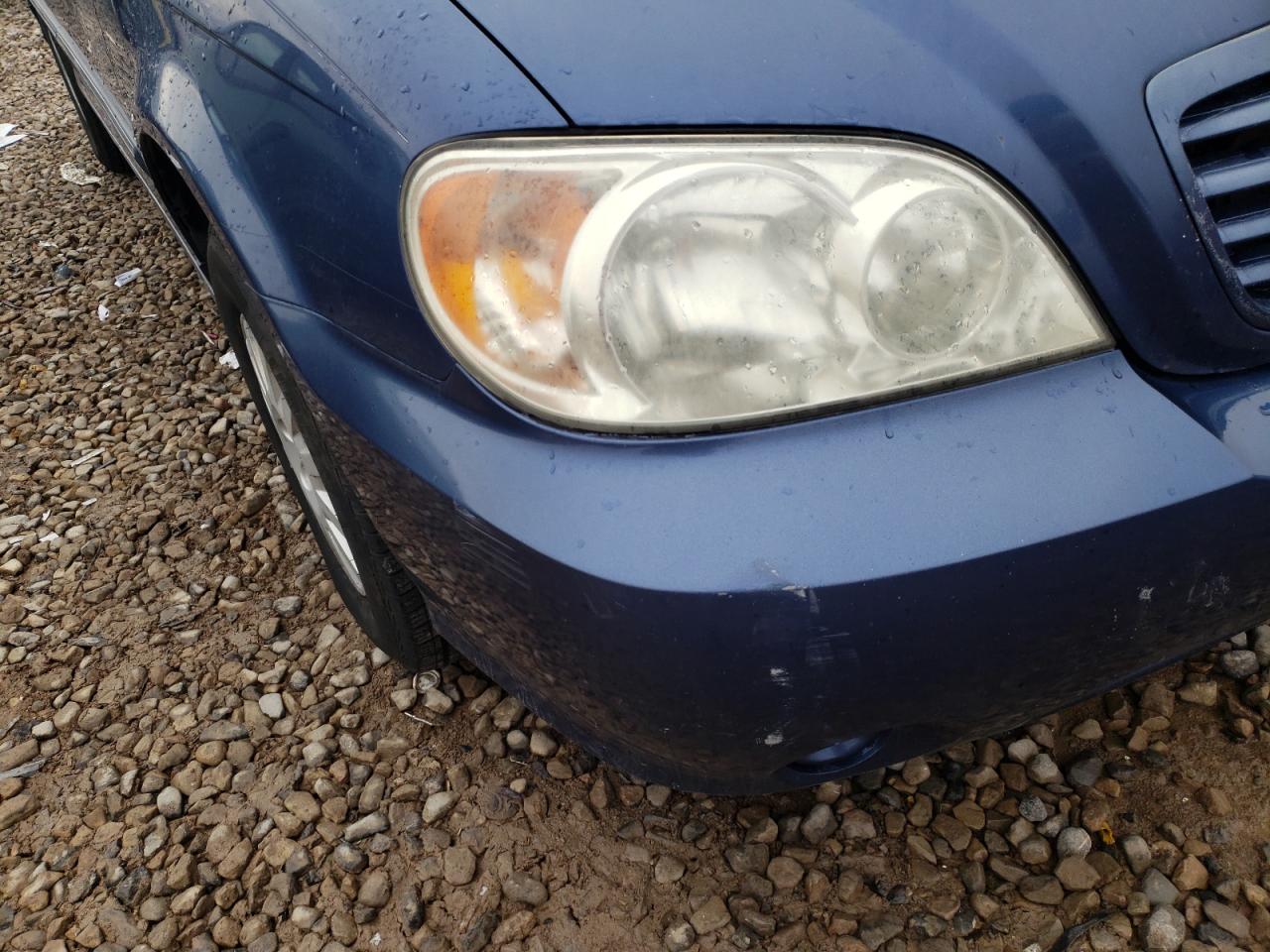 Photo 9 from auction – 2003 KIA SEDONA EX with VIN KNDUP131236452850