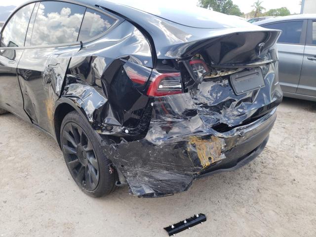 Photo 9 from auction – 2021 TESLA MODEL Y with VIN 5YJYGDEE3MF264928