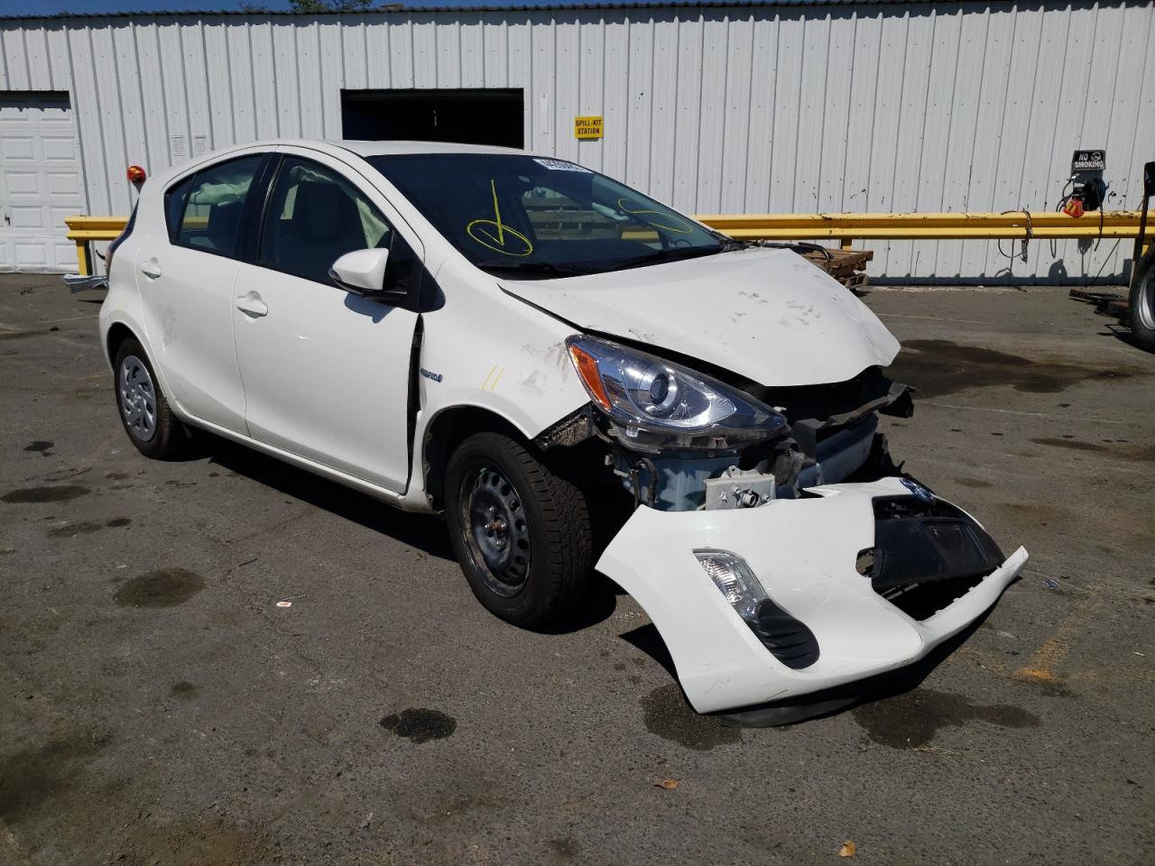 TOYOTA PRIUS C 2016 with VIN JTDKDTB33G1134818 - Photo from auction