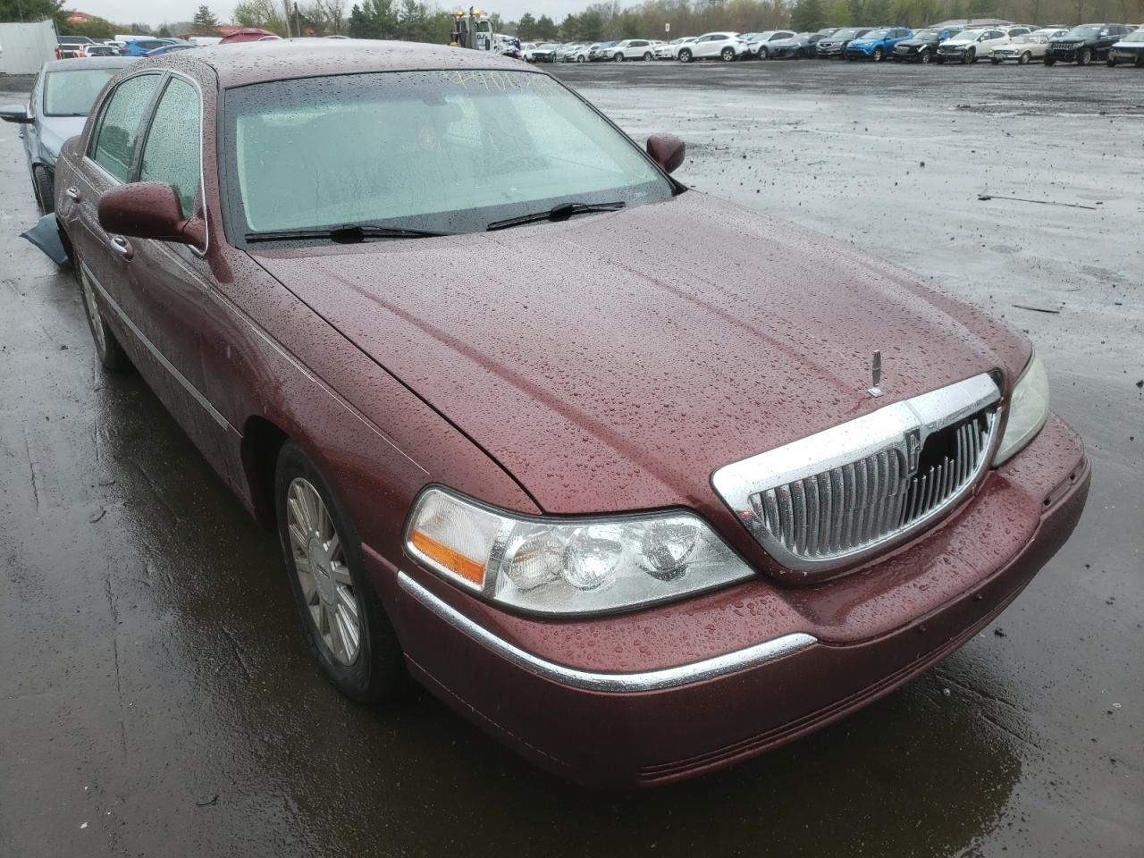 LINCOLN TOWN CAR E 2003 with VIN 1LNHM81W83Y649247 - Photo from auction