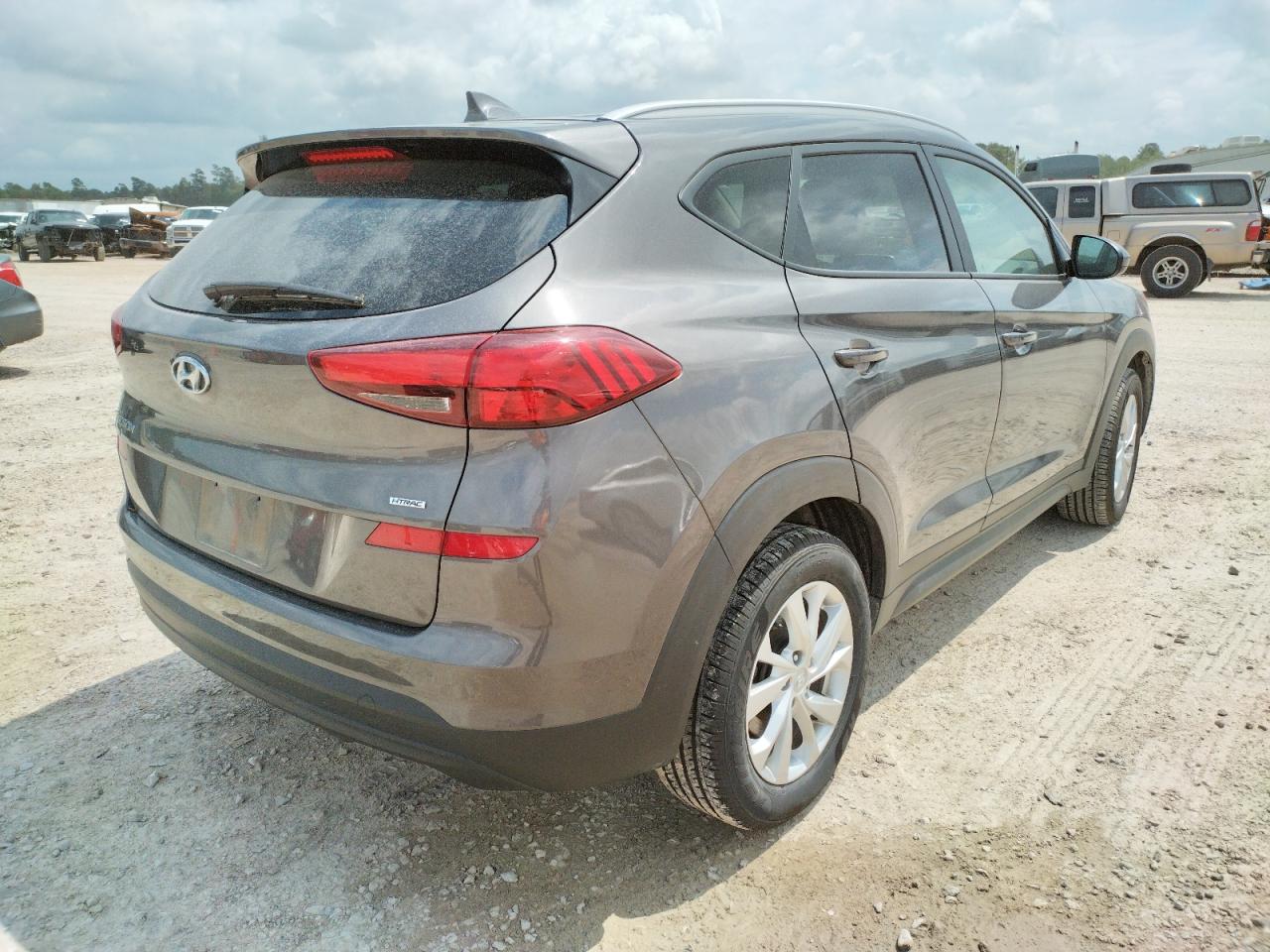 Photo 4 from auction – 2020 HYUNDAI TUCSON LIM with VIN KM8J3CA44LU119936