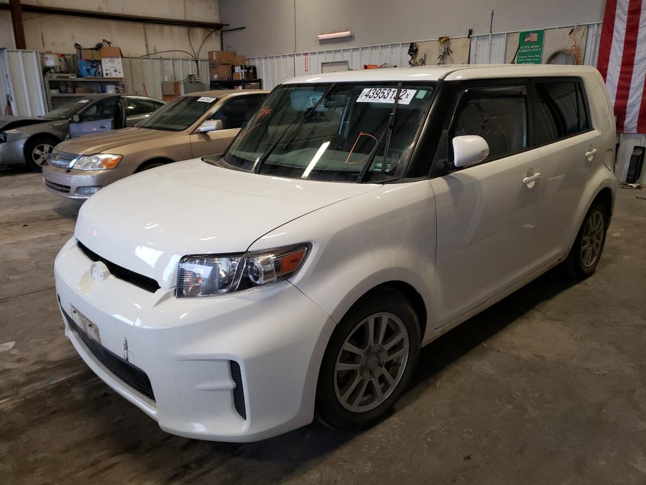 Photo 2 from auction – 2012 TOYOTA SCION XB with VIN JTLZE4FE0CJ012641