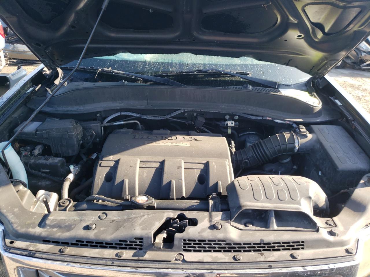 Photo 7 from auction – 2014 HONDA RIDGELINE with VIN 5FPYK1F53EB006509