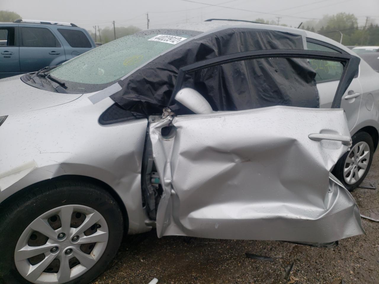 Photo 9 from auction – 2013 KIA RIO LX with VIN KNADM4A34D6159500