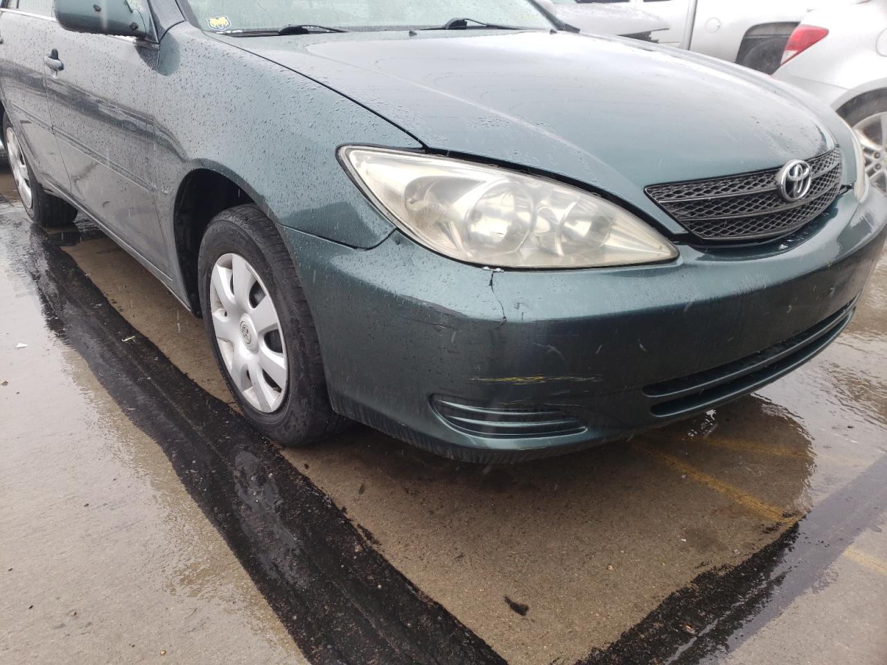 Photo 9 from auction – 2003 TOYOTA CAMRY LE with VIN 4T1BE30K23U699380