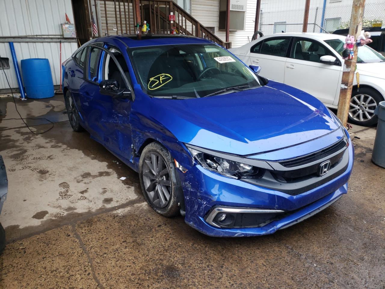 HONDA CIVIC EX 2019 with VIN 19XFC1F32KE207640 - Photo from auction