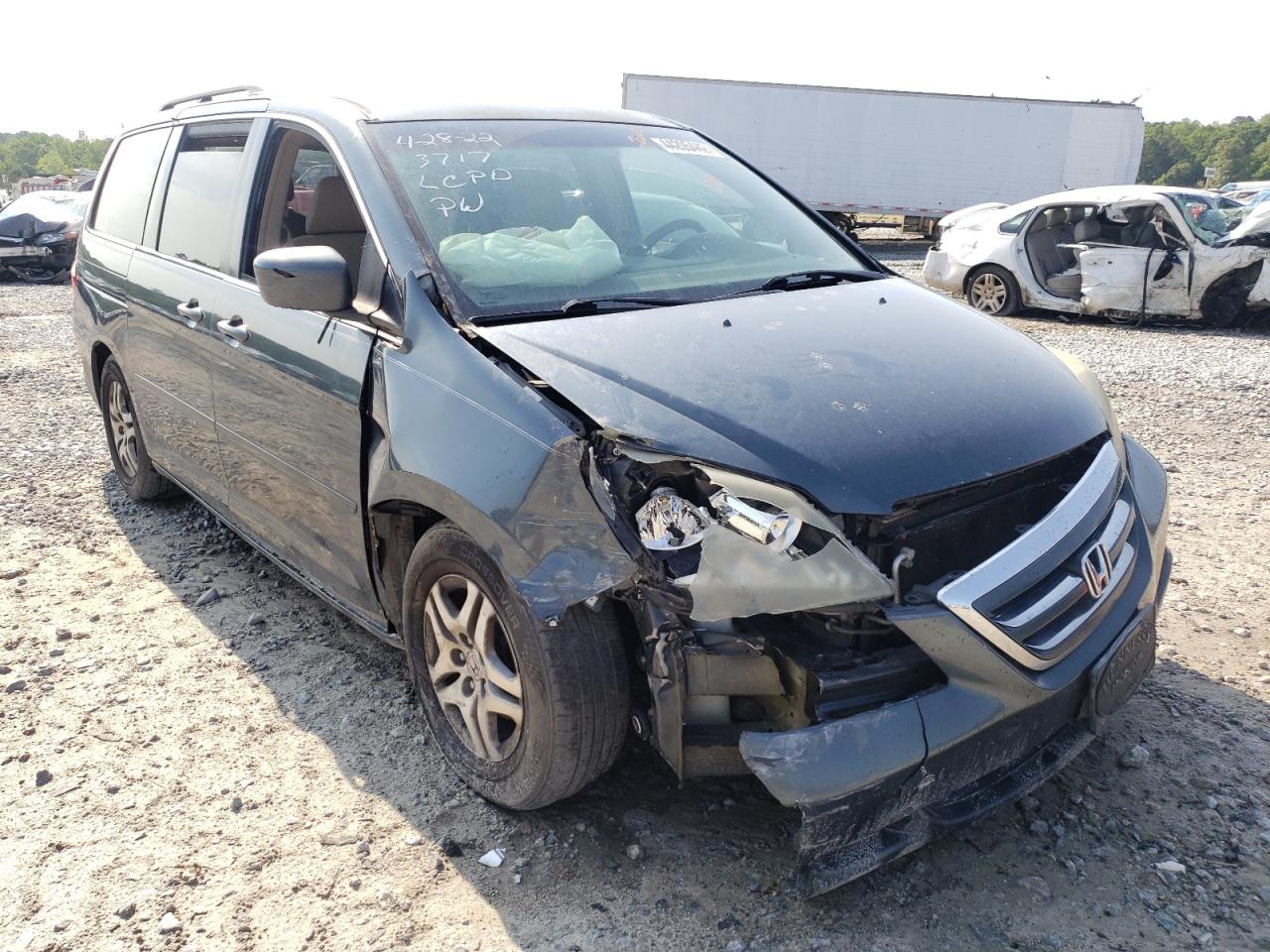 HONDA ODYSSEY EX 2006 with VIN 5FNRL38476B403717 - Photo from auction