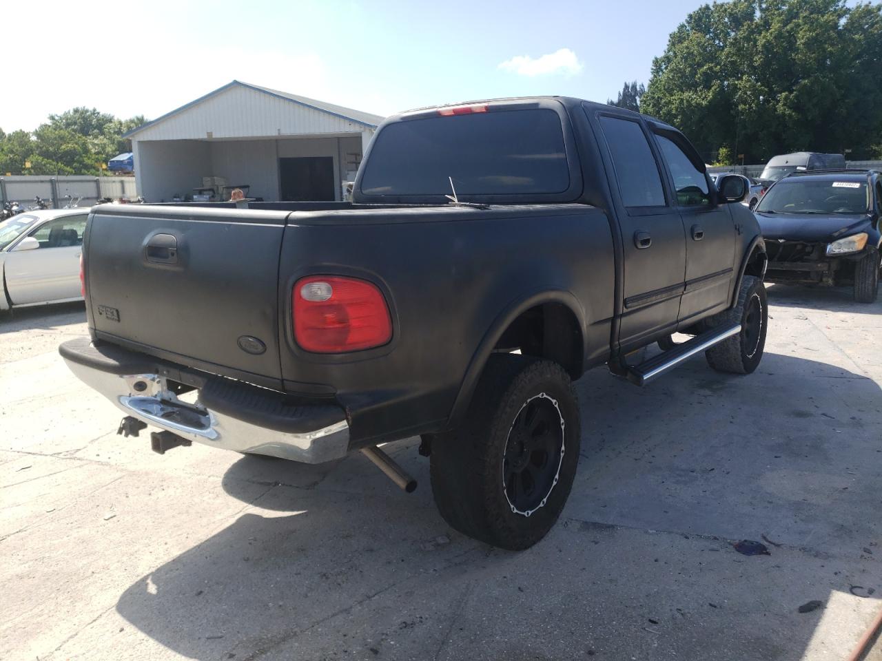 Photo 4 from auction – 2001 FORD F150 SUPER with VIN 1FTRW08L61KB85309