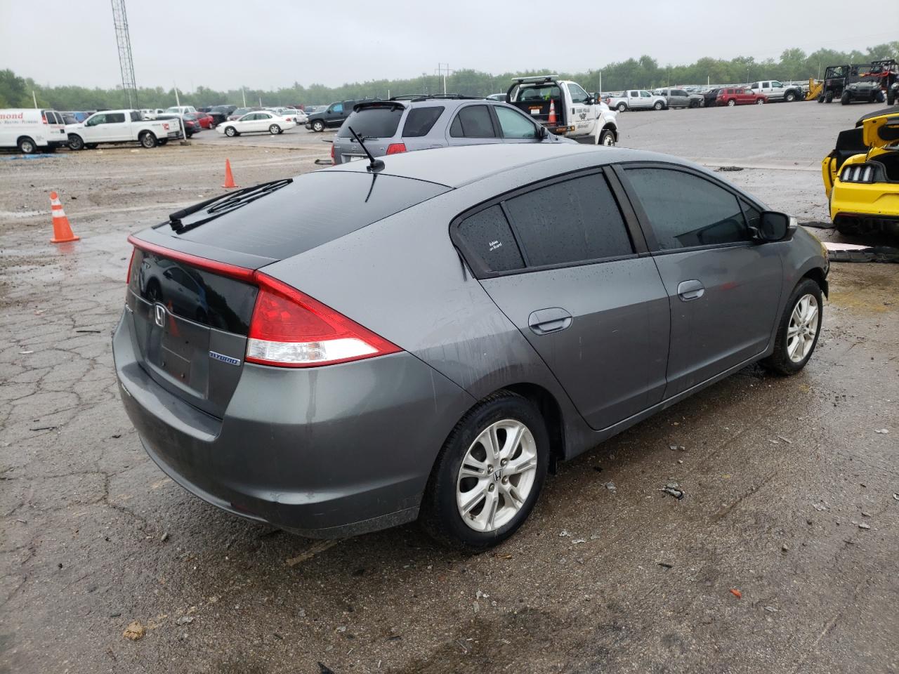 Photo 4 from auction – 2010 HONDA INSIGHT EX with VIN JHMZE2H79AS012691
