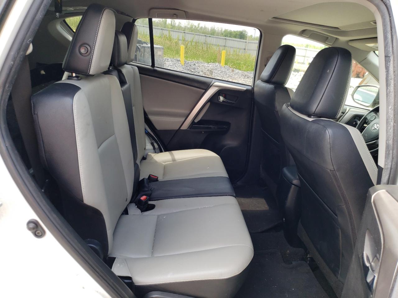 Photo 6 from auction – 2018 TOYOTA RAV4 LIMIT with VIN JTMYFREV7JJ150984