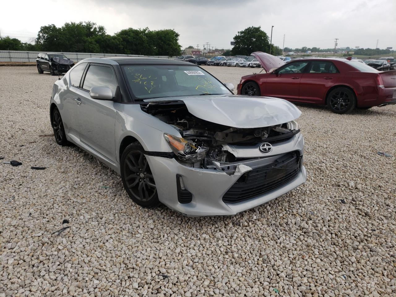 TOYOTA SCION TC 2014 with VIN JTKJF5C76E3067533 - Photo from auction