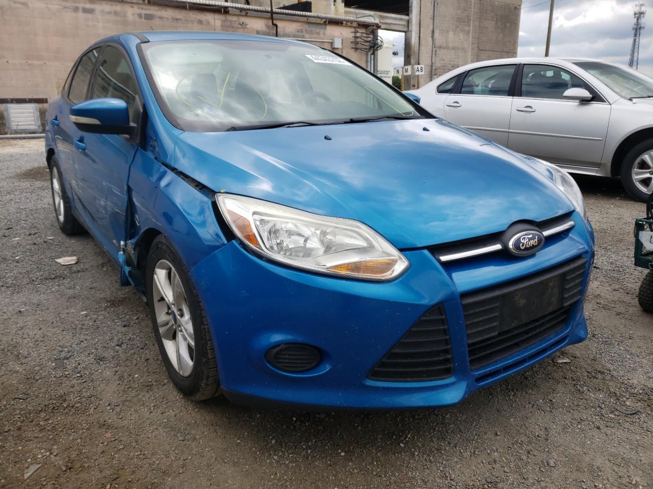 FORD FOCUS SE 2014 with VIN 1FADP3F26EL370517 - Photo from auction