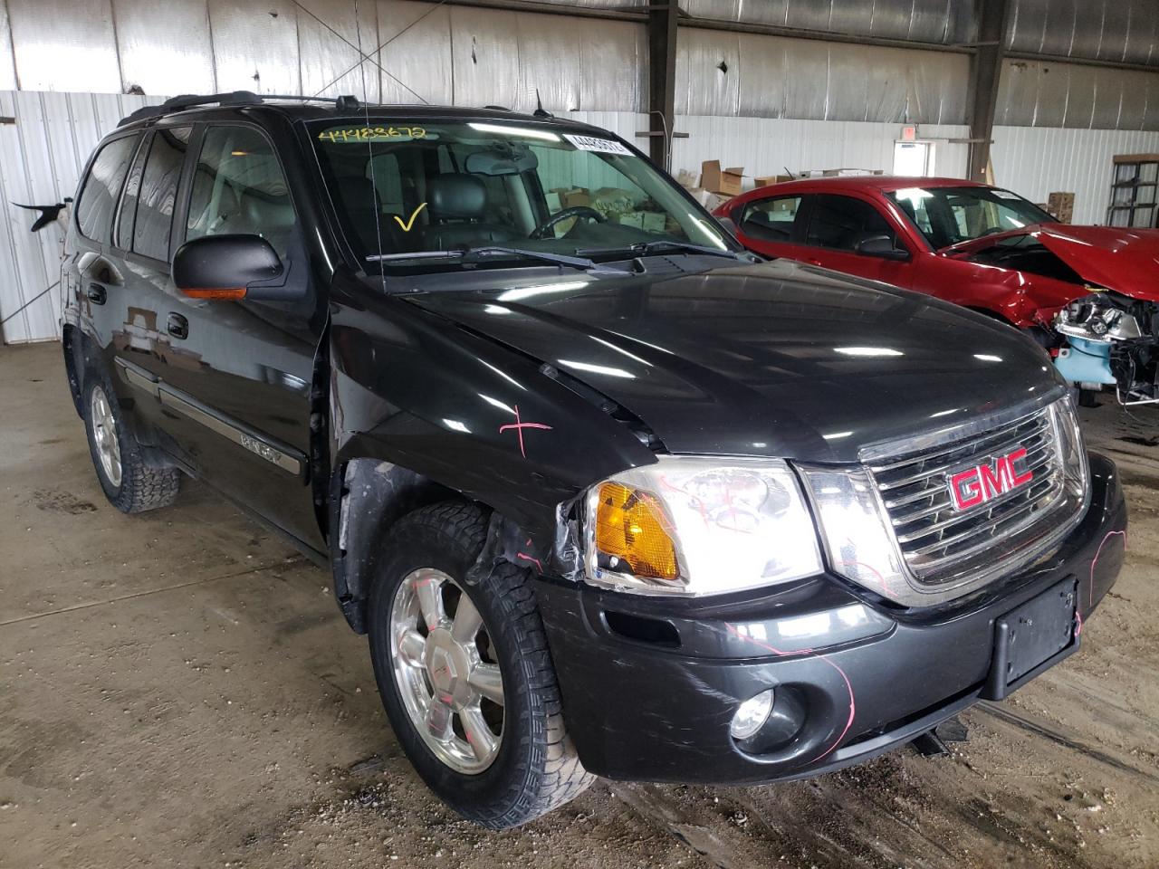 GMC ENVOY 2005 with VIN 1GKDT13S352252451 - Photo from auction