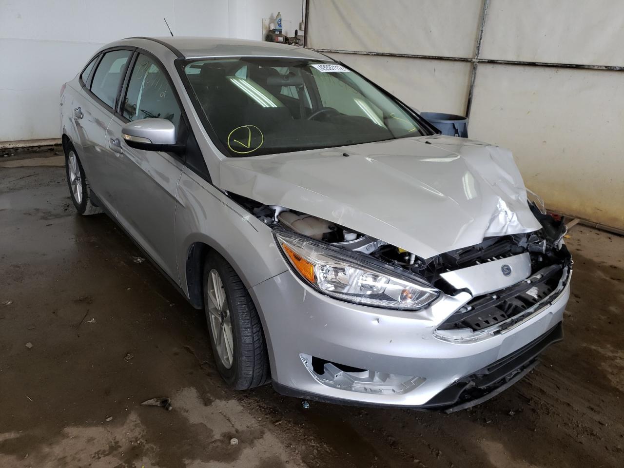 FORD FOCUS SE 2015 with VIN 1FADP3F21FL384374 - Photo from auction