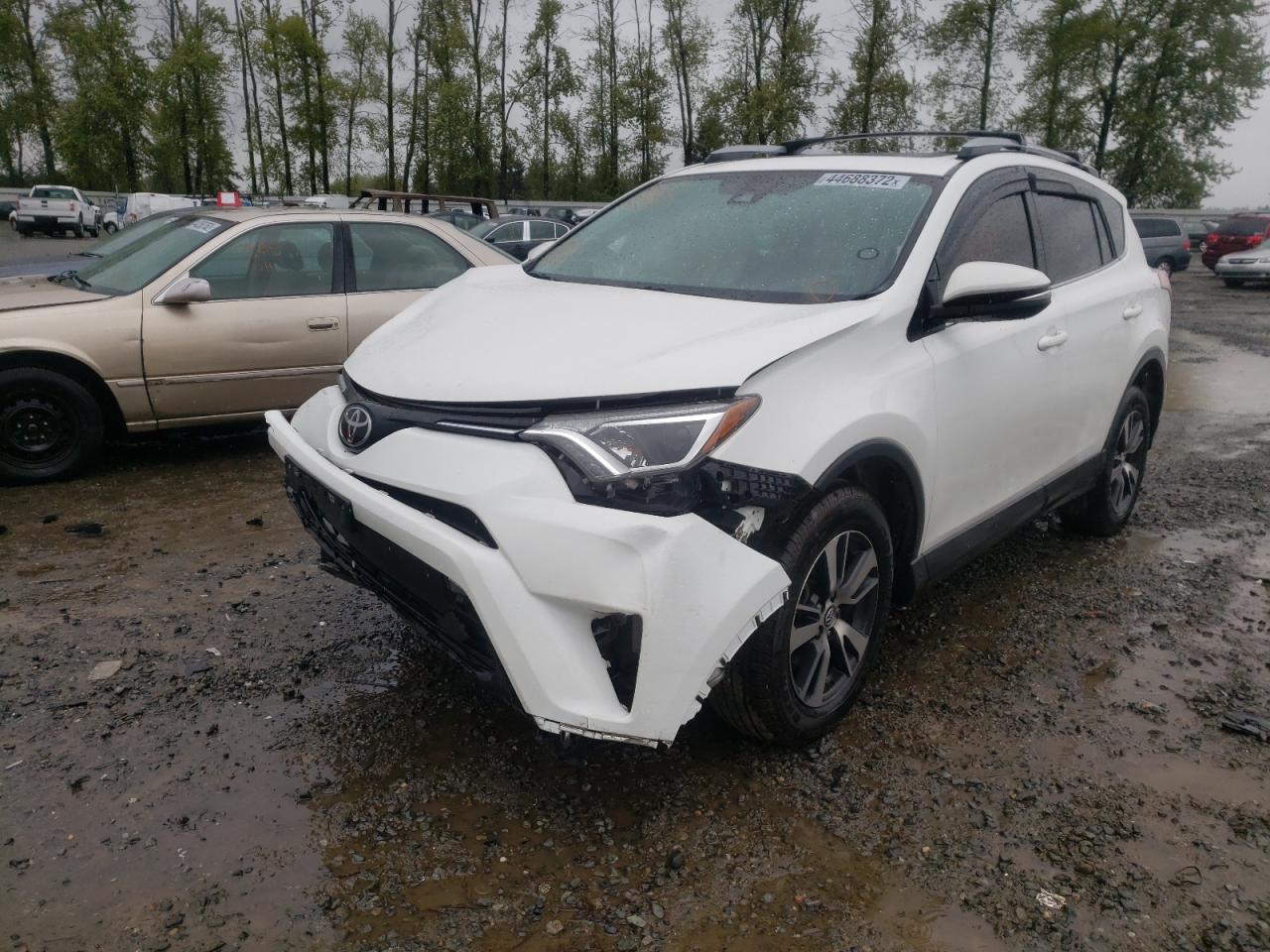 Photo 2 from auction – 2017 TOYOTA RAV4 XLE with VIN JTMRFREV5HJ116590