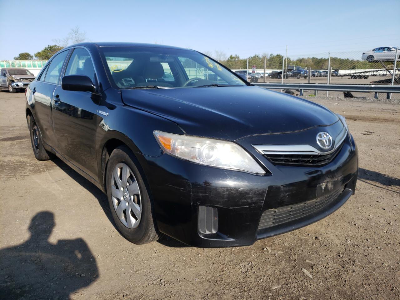 TOYOTA CAMRY HYBR 2011 with VIN 4T1BB3EK6BU142245 - Photo from auction