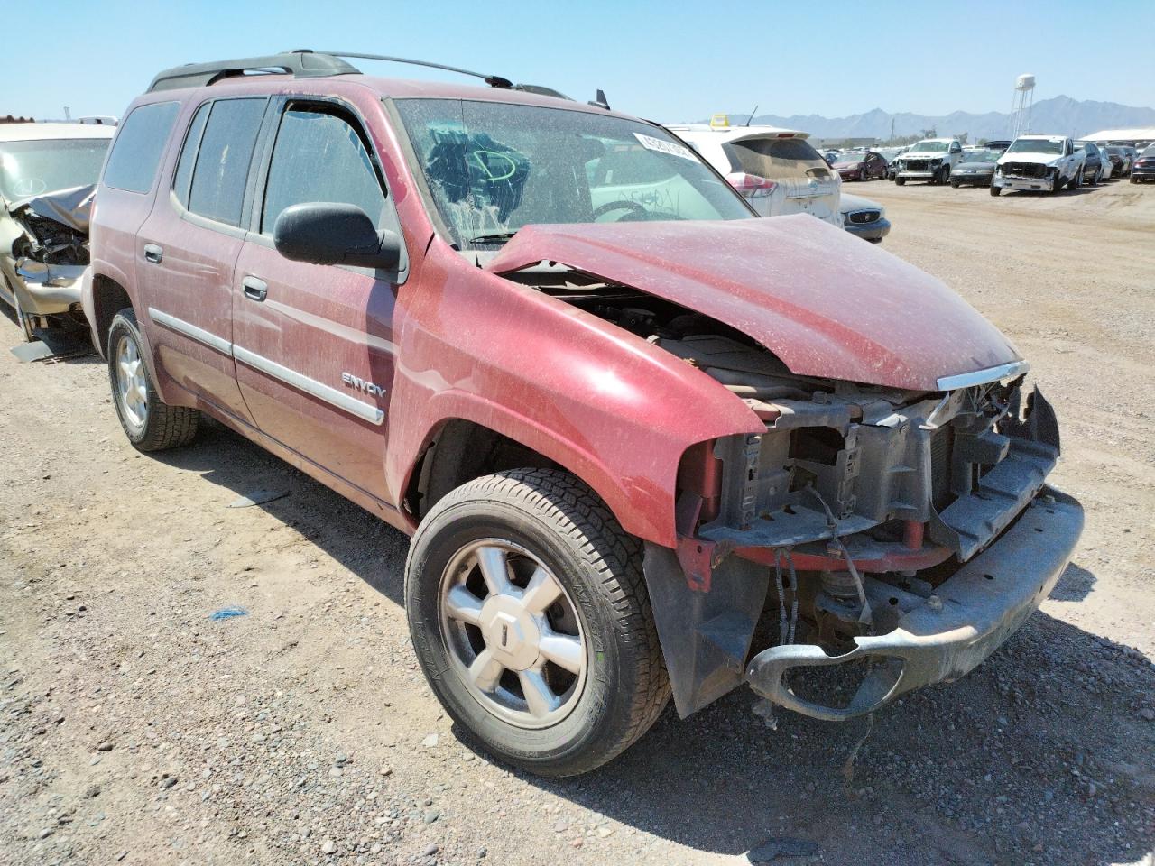 GMC ENVOY 2006 with VIN 1GKES16S166155276 - Photo from auction