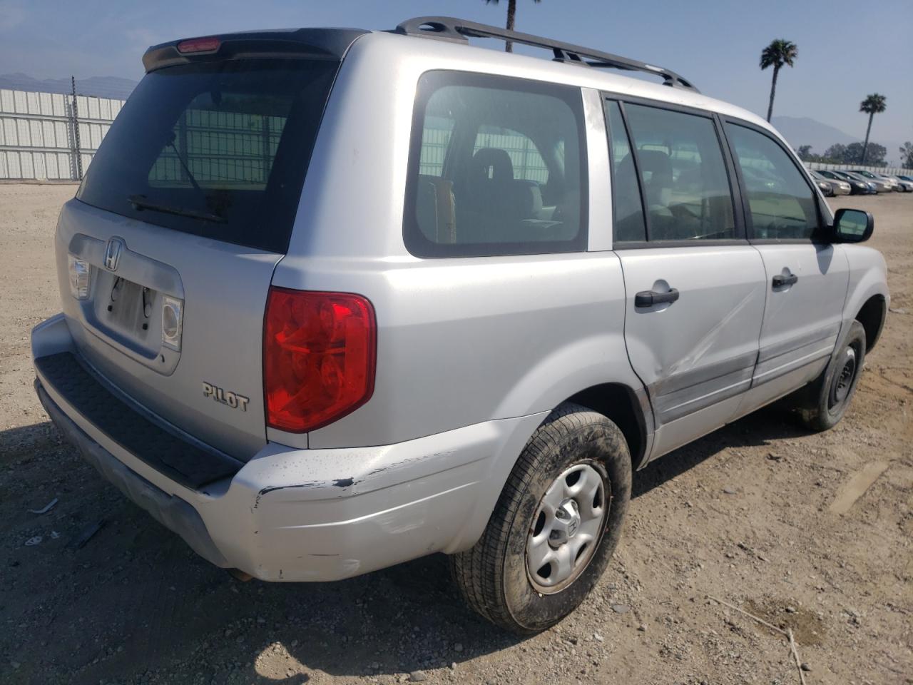 Photo 4 from auction – 2003 HONDA PILOT LX with VIN 2HKYF18163H586554