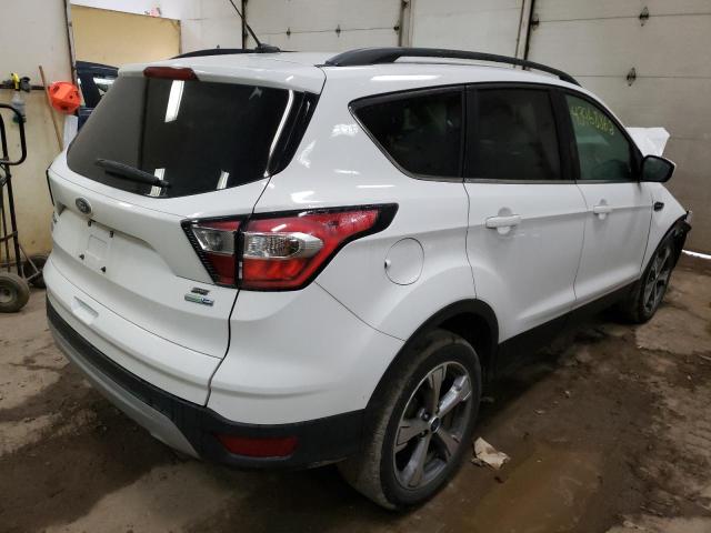 Photo 4 from auction – 2017 FORD ESCAPE SE with VIN 1FMCU9GD8HUD30368