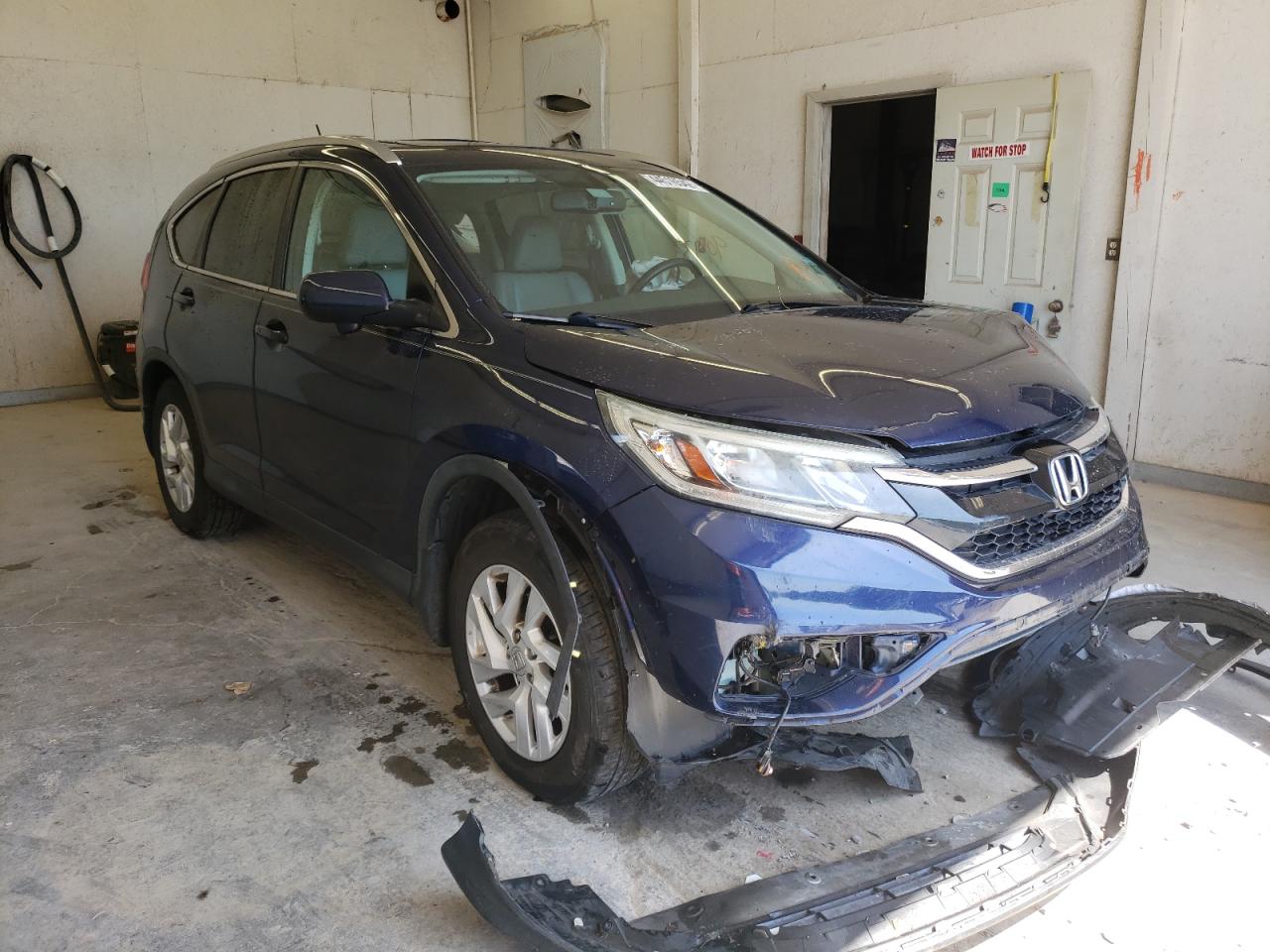 Photo 1 from auction – 2015 HONDA CR-V EXL with VIN 2HKRM3H77FH527530