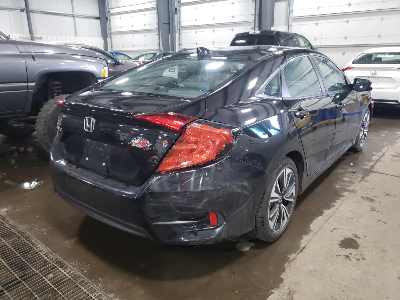 Photo 4 from auction – 2016 HONDA CIVIC EXL with VIN 19XFC1F77GE020761