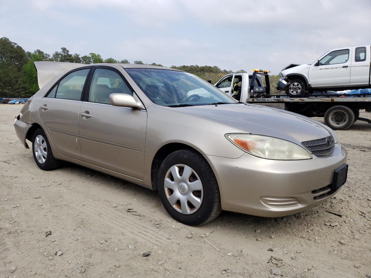 TOYOTA CAMRY LE 2002 with VIN JTDBE32K620005829 - Photo from auction
