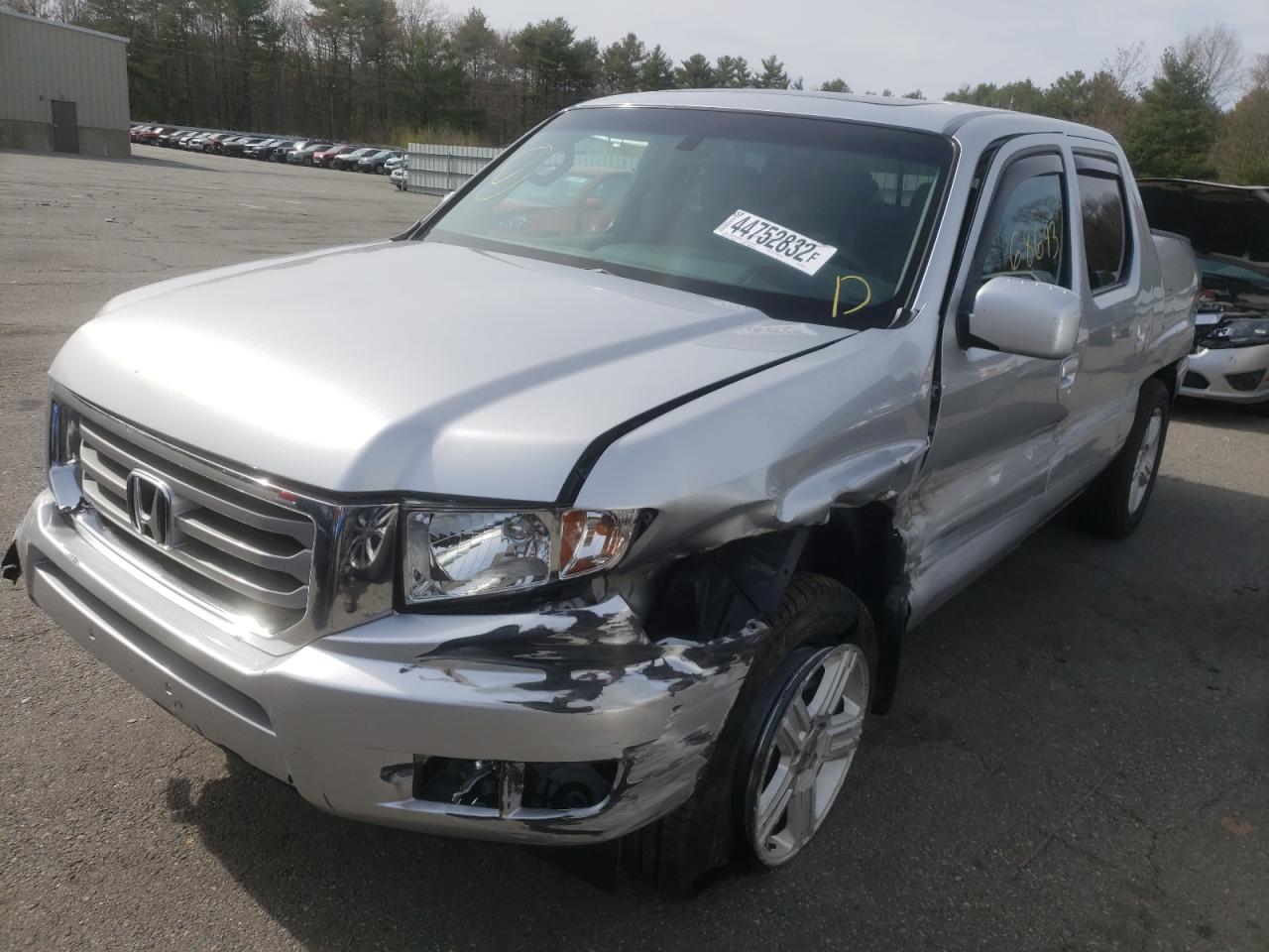 Photo 2 from auction – 2012 HONDA RIDGELINE with VIN 5FPYK1F51CB451943