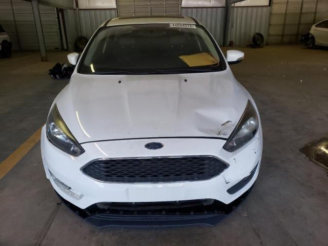 Photo 9 from auction – 2015 FORD FOCUS SE with VIN 1FADP3F29FL318140