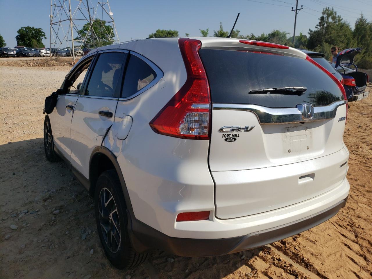 Photo 16 from auction – 2016 HONDA CR-V SE with VIN 5J6RM4H46GL116168