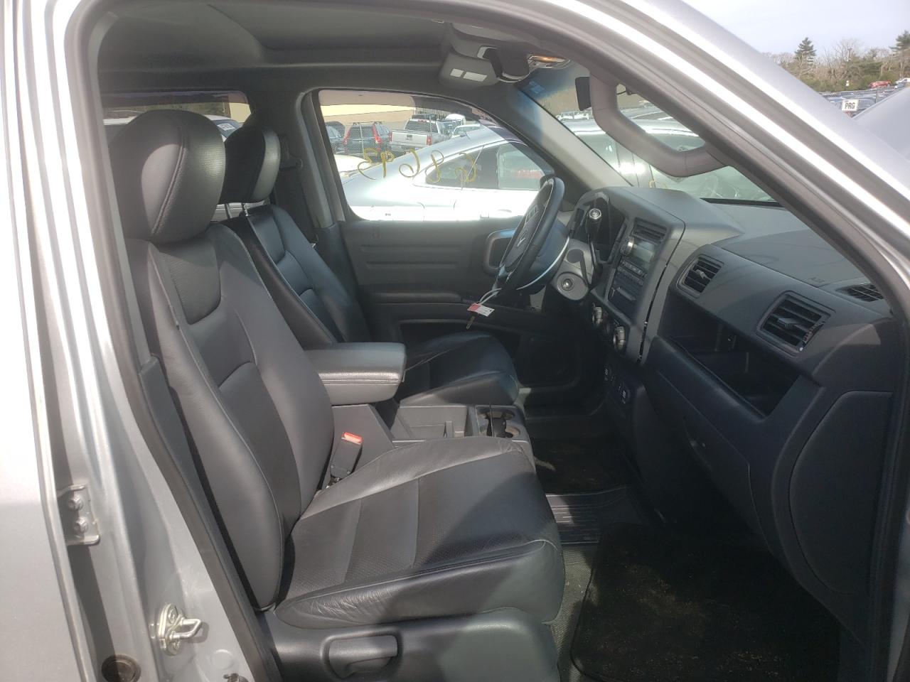 Photo 5 from auction – 2012 HONDA RIDGELINE with VIN 5FPYK1F51CB451943
