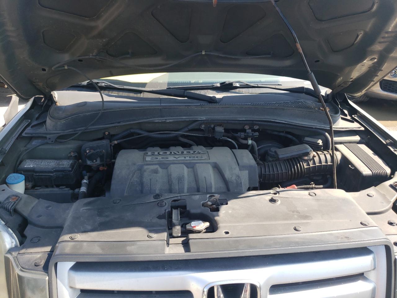 Photo 7 from auction – 2006 HONDA PILOT EX with VIN 5FNYF18486B024541