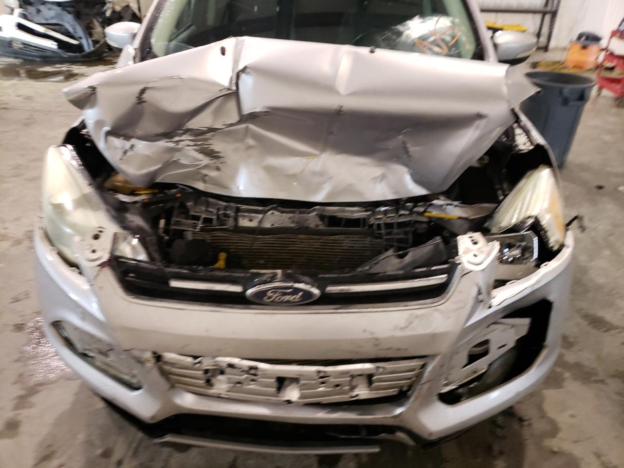 Photo 9 from auction – 2016 FORD ESCAPE TIT with VIN 1FMCU0J90GUC14113