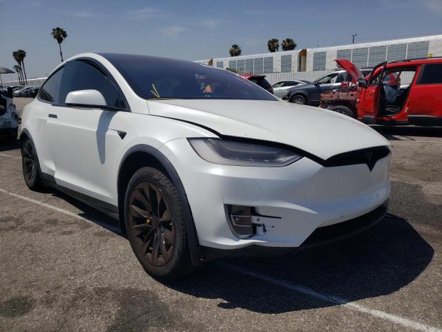 TESLA MODEL X 2017 with VIN 5YJXCBE20HF050082 - Photo from auction