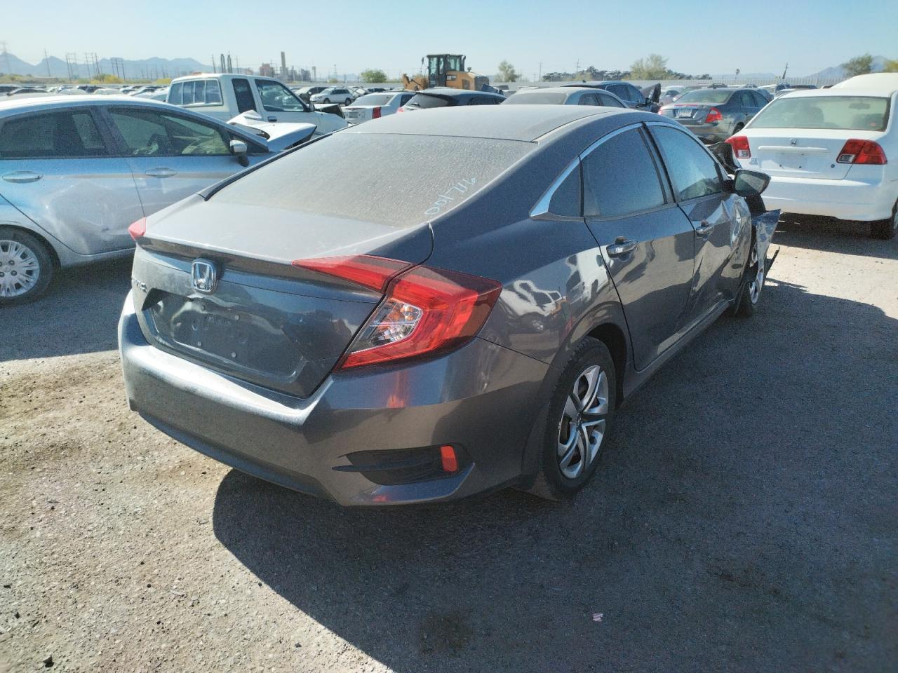 Photo 4 from auction – 2017 HONDA CIVIC LX with VIN 19XFC2F59HE001716