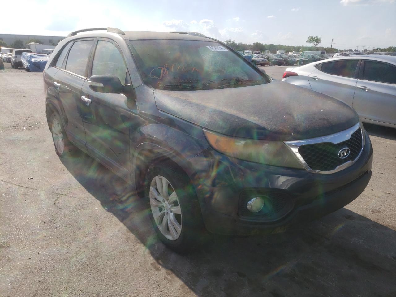 KIA SORENTO EX 2011 with VIN 5XYKU4A24BG031298 - Photo from auction