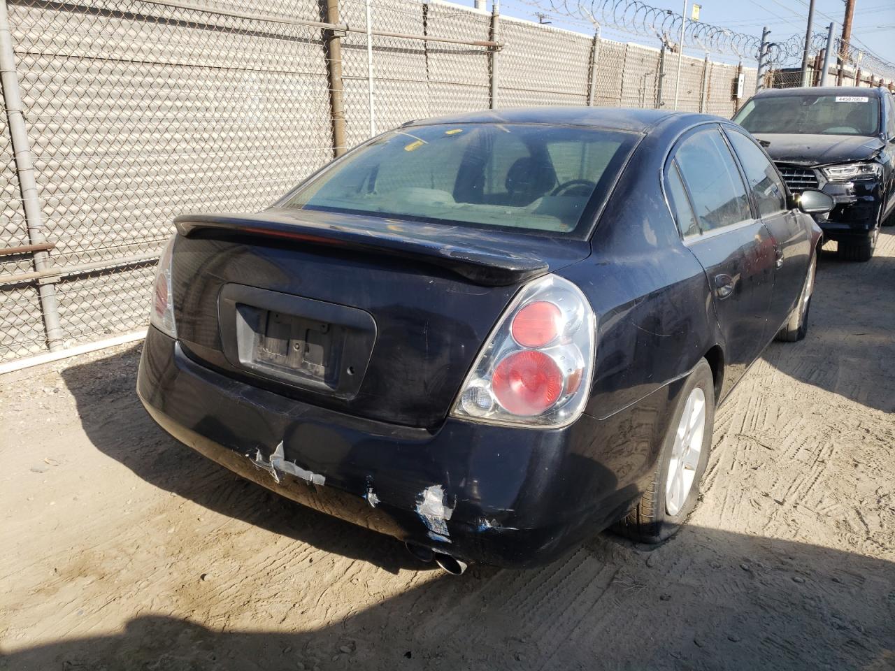 Photo 4 from auction – 2002 NISSAN ALTIMA BAS with VIN 1N4AL11D82C701590