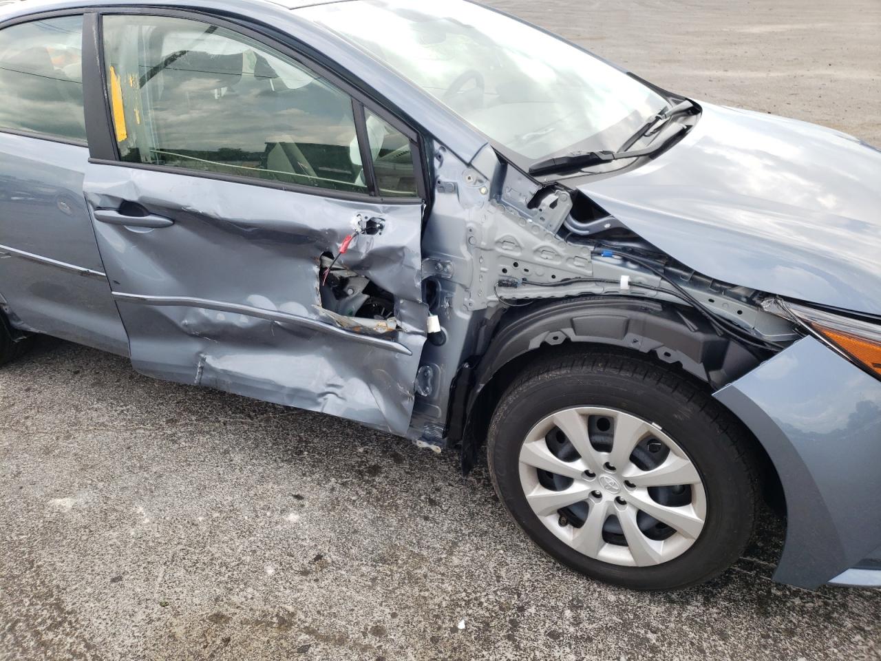 Photo 9 from auction – 2022 TOYOTA COROLLA LE with VIN JTDEPMAE7N3000571